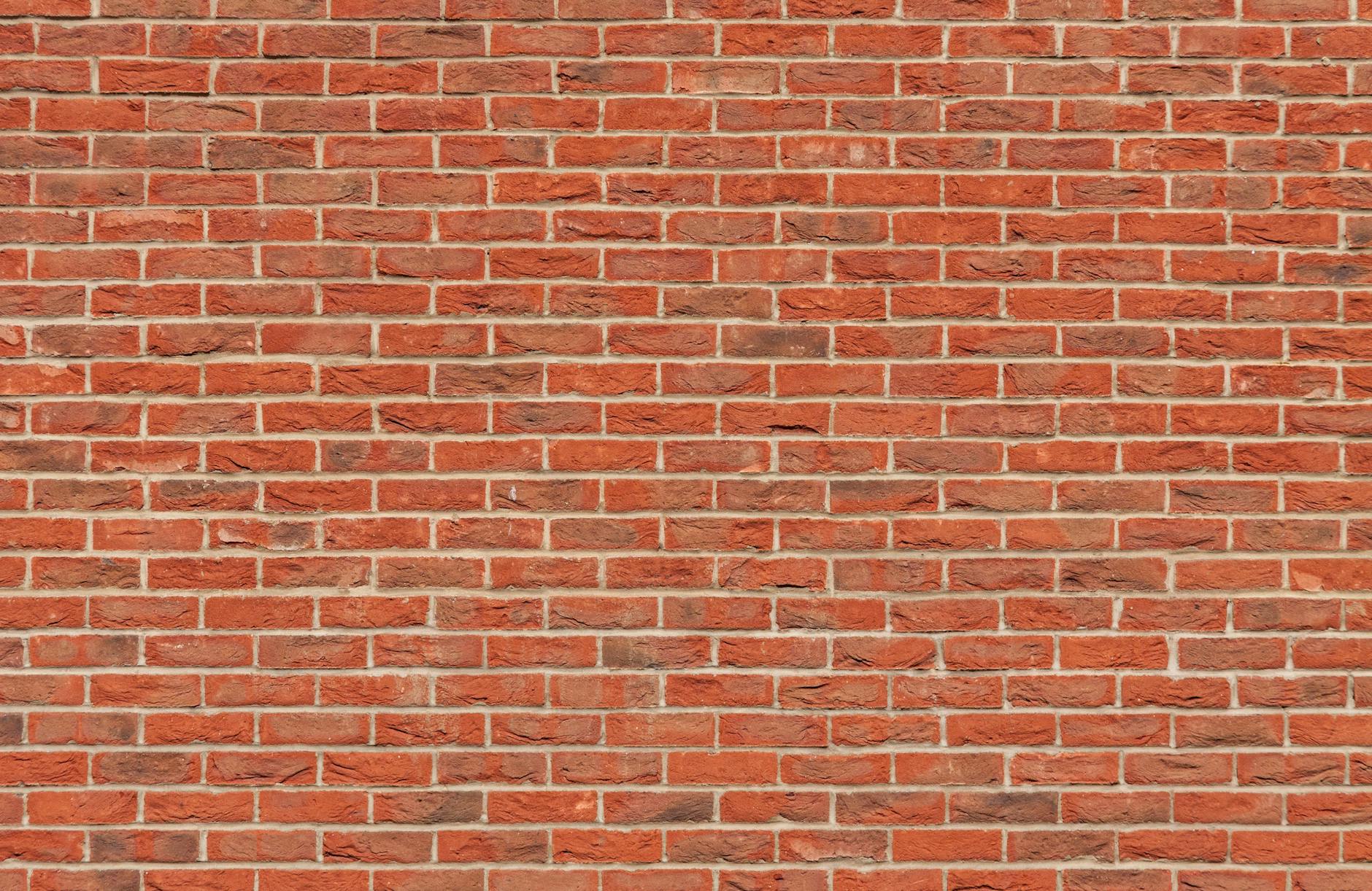 A classic red brick wall background, perfect for design and architectural themes.